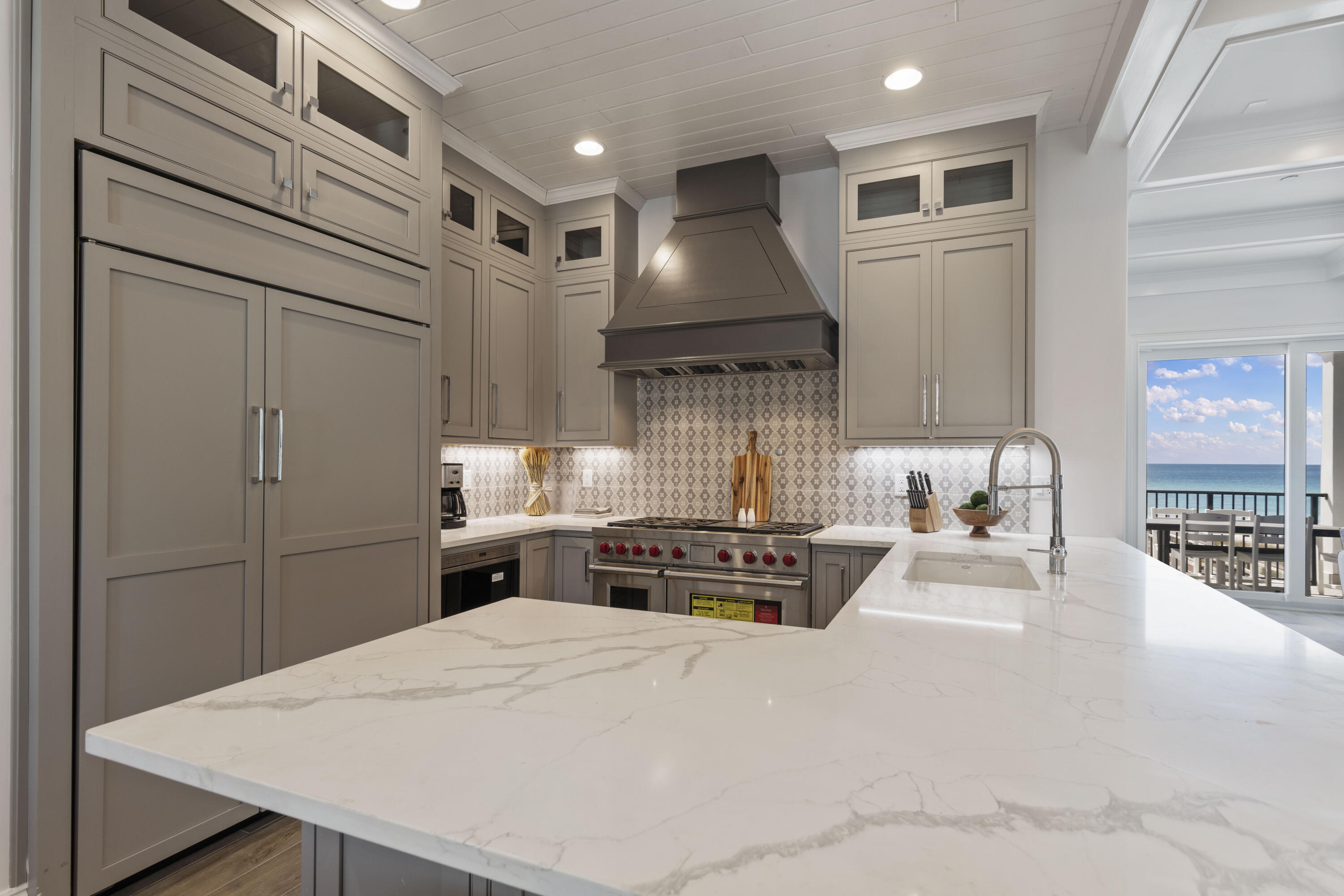 26 Azzurro Way Santa Rosa Beach, FL 32459 - Photo 54 of 78 a kitchen with stainless steel appliances a stove a sink and a refrigerator