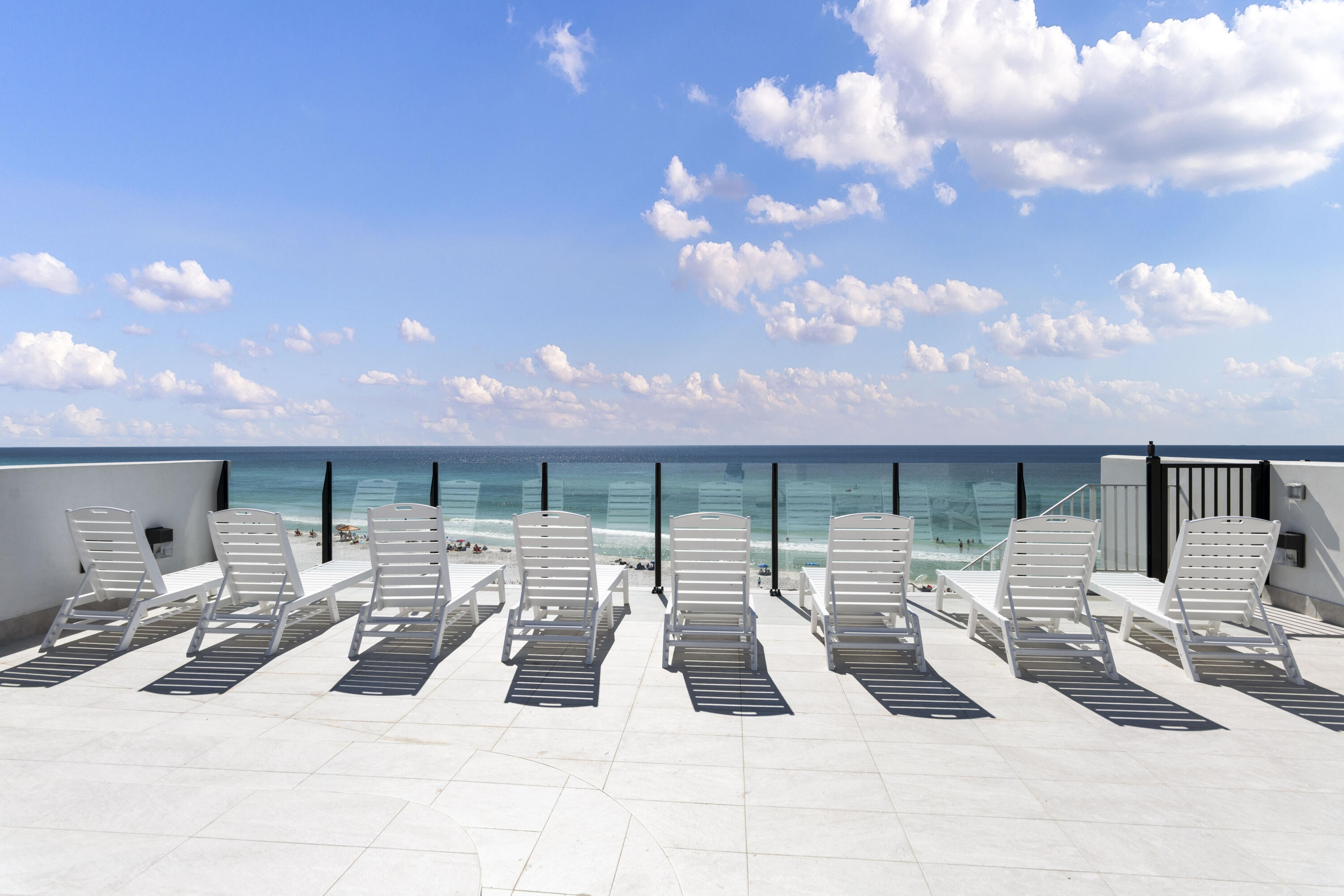 26 Azzurro Way Santa Rosa Beach, FL 32459 - Photo 75 of 78 a view of a patio with dining table and chairs with an outdoor space