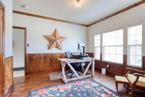 a workspace with furniture and a window
