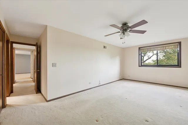 a view of a big room with carpet