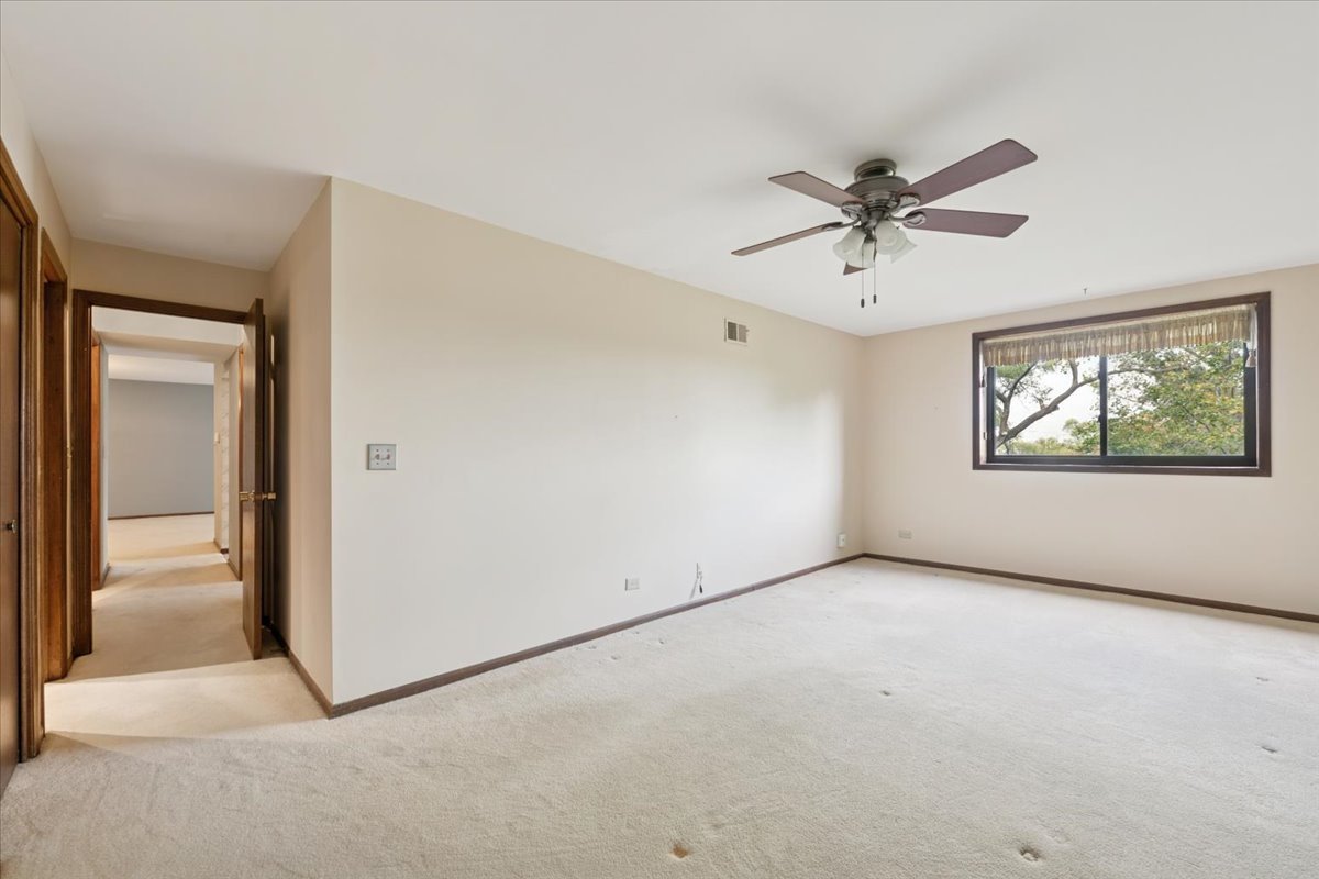 1-s150 Spring Road, Unit 4L Oak Brook, IL 60181 - Photo 12 of 18 a view of a big room with carpet