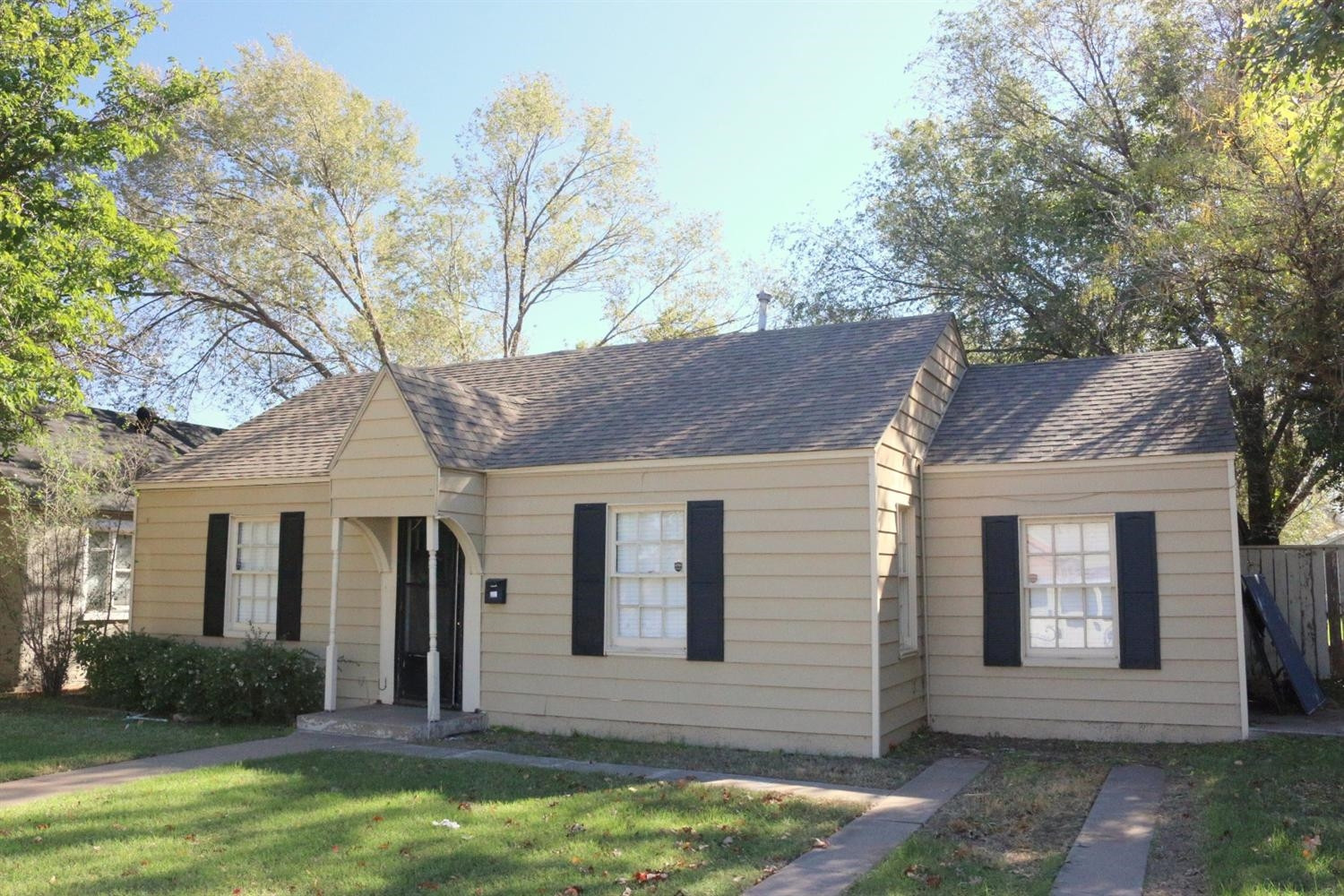 2405 22nd Street Lubbock, TX 79411 - Photo 2 of 10 a front view of a house with a yard