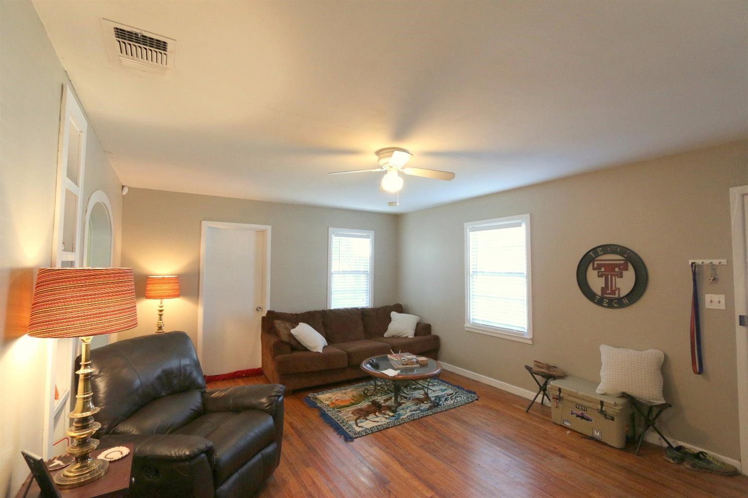 2405 22nd Street Lubbock, TX 79411 - Photo 6 of 10 a living room with furniture and a window