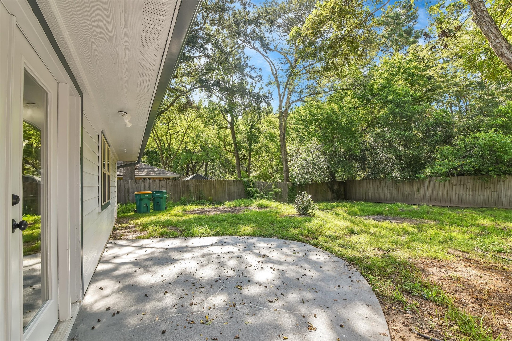 345 Maple Lane Conroe, TX 77304 - Photo 28 of 35 a view of backyard with green space