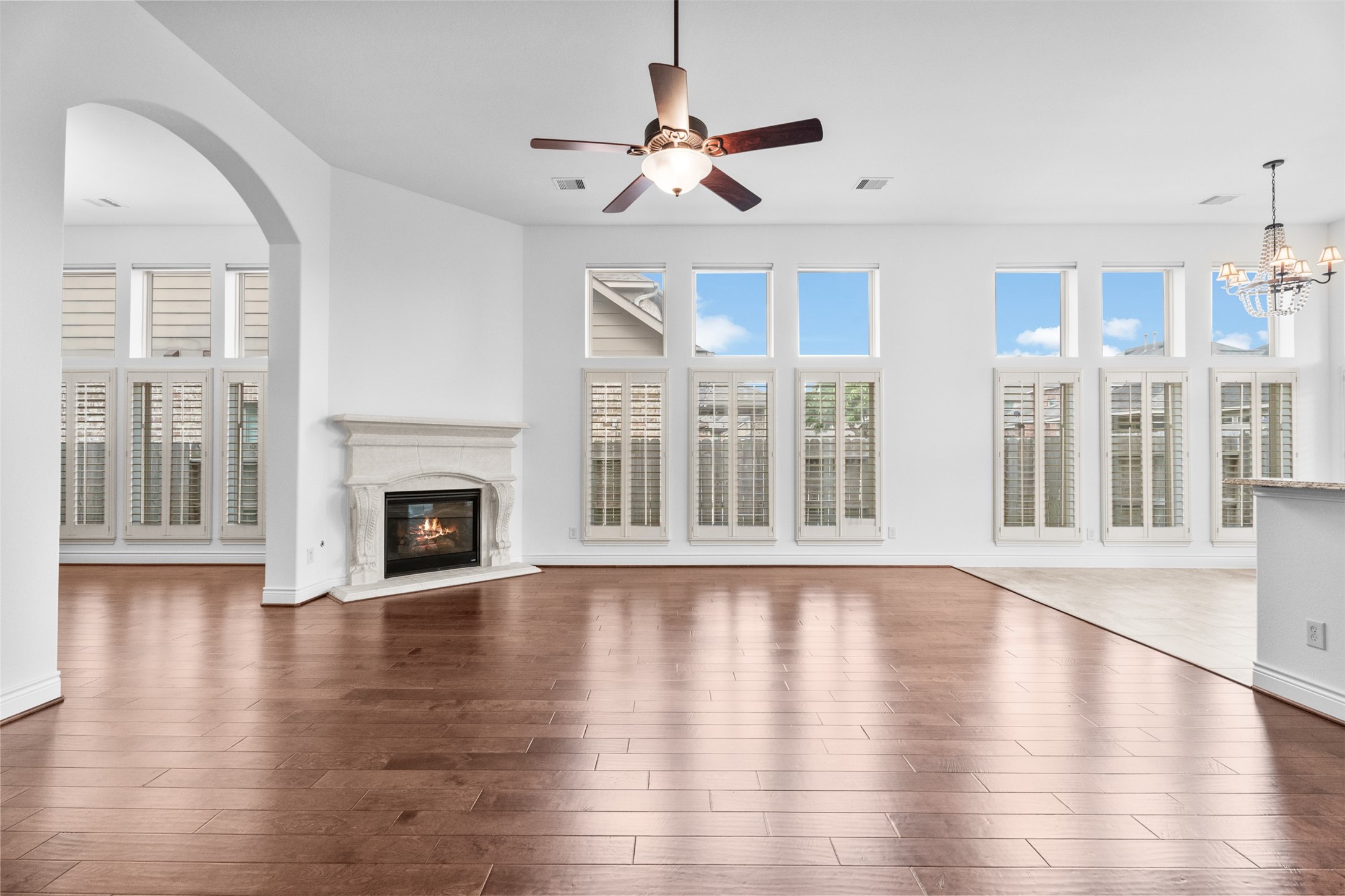 27318 Pendleton Trace Drive Spring, TX 77386 - Photo 4 of 47 This home is drenched in sunlight. Plantation shutters on every window and remote controlled blinds on all the taller windows. Gorgeous hardwood floors.