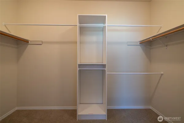 a view of an empty walk in closet