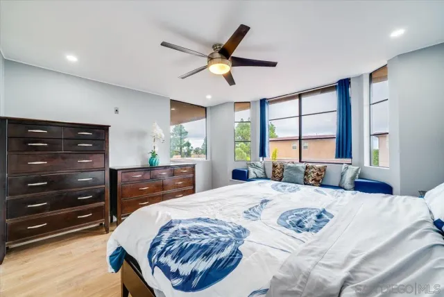 a bed room with a bed and a dresser