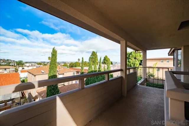a view of a terrace with furniture and a terrace view