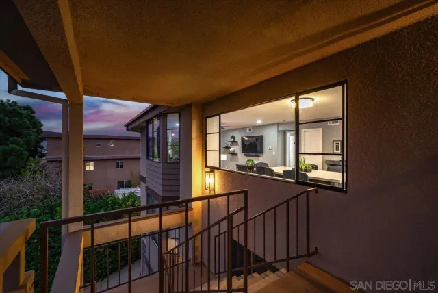 a view of a building with a yard