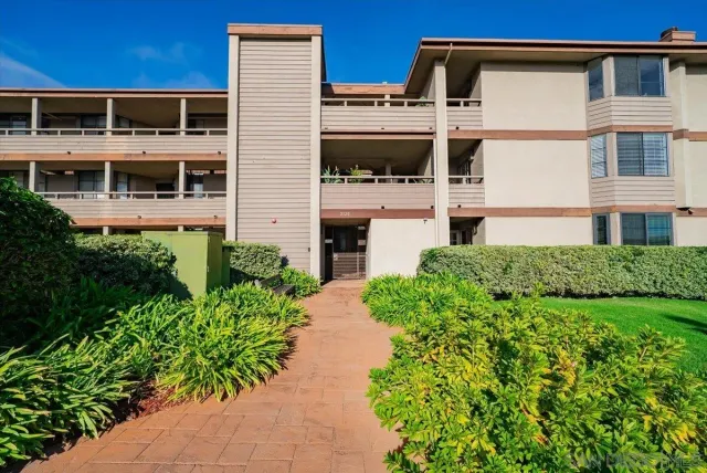 a house view with a garden space
