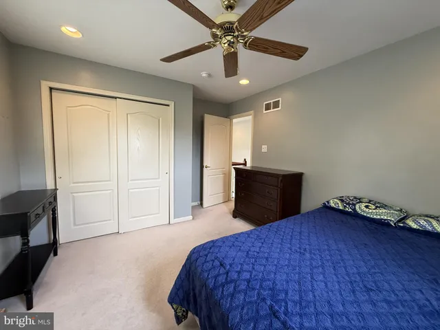a bedroom with furniture