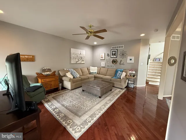 a kitchen with stainless steel appliances granite countertop a stove sink and cabinets