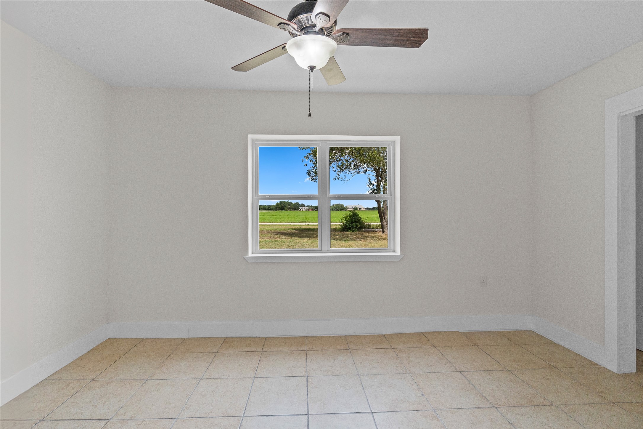 16752 Rio Rancho Road Harlingen, TX 78552 - Photo 11 of 25 a view of an entryway and chandelier fan