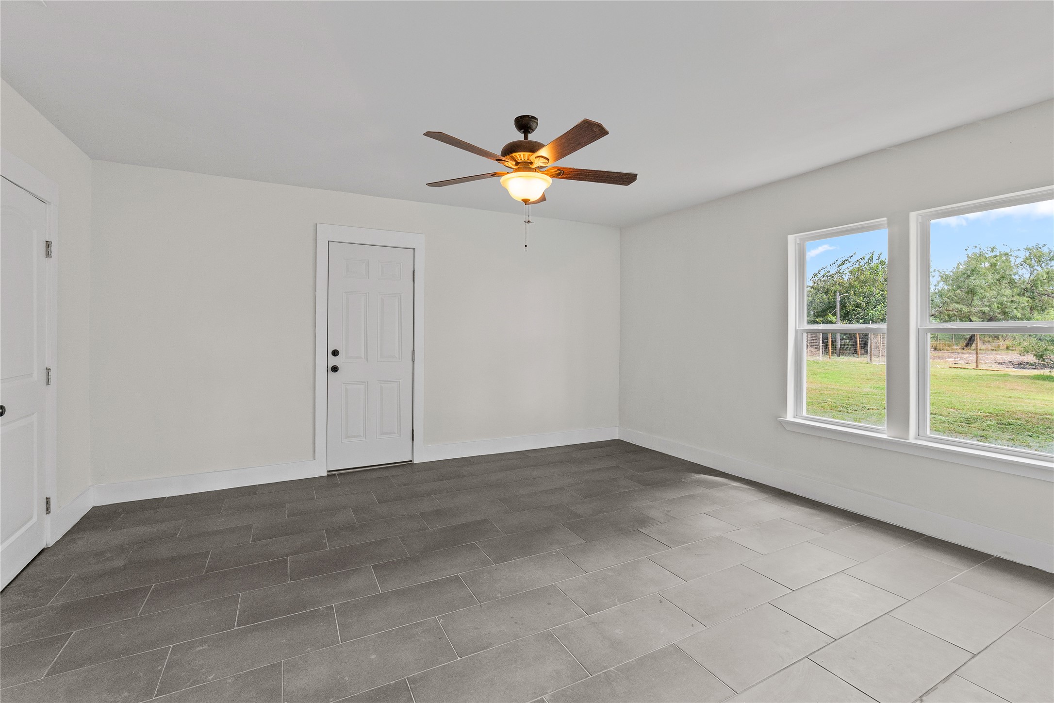 16752 Rio Rancho Road Harlingen, TX 78552 - Photo 15 of 25 a view of an empty room with a window