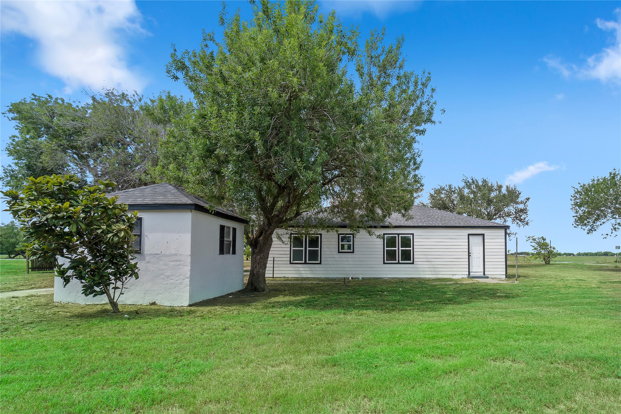 16752 Rio Rancho Road Harlingen, TX 78552 - Photo 19 of 25 a house view with a garden space