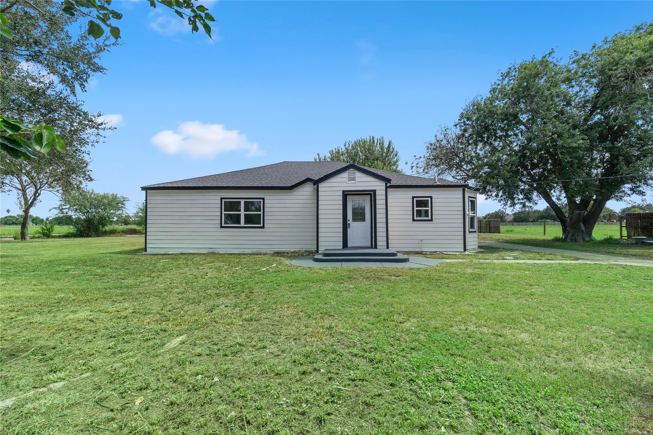 16752 Rio Rancho Road Harlingen, TX 78552 - Photo 2 of 25 a view of a house with a backyard