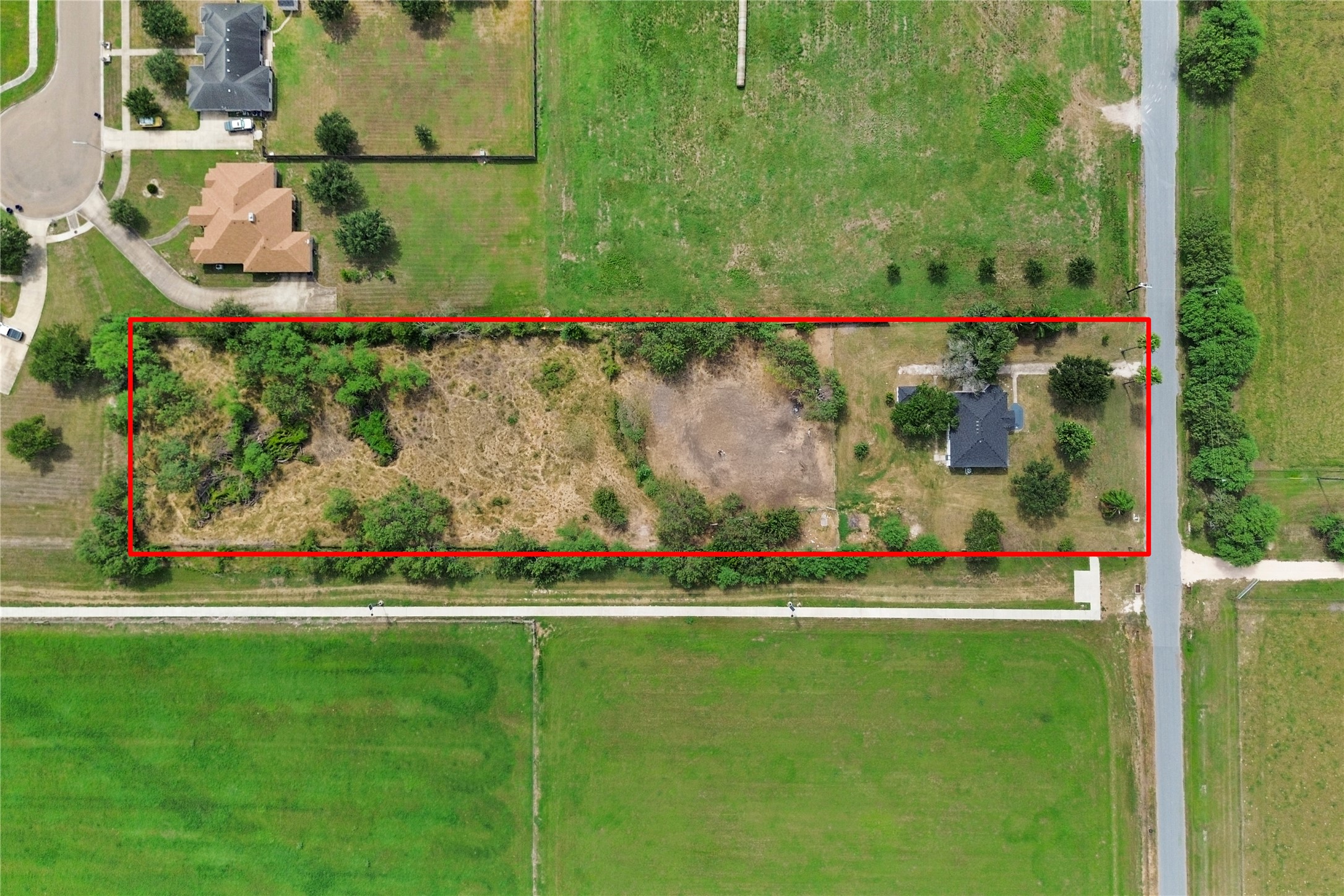 16752 Rio Rancho Road Harlingen, TX 78552 - Photo 21 of 25 front view of a house with a yard