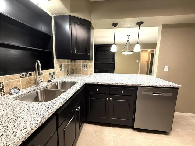 a bathroom with a sink double vanity and a mirror