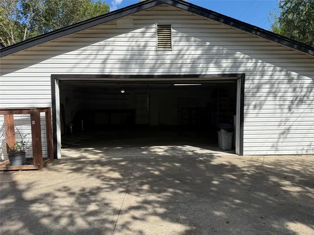 a front view of a house with garage