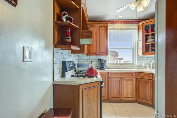 a kitchen with a sink cabinets and appliances