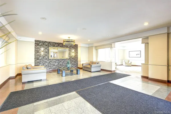 a living room with furniture and a table