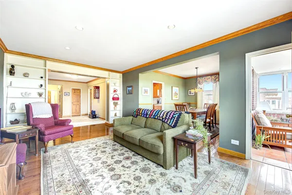 a living room with furniture and a rug