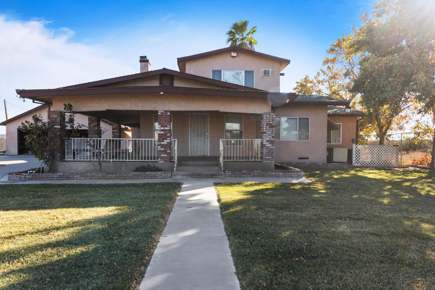 5000 Nunes Road Turlock, CA 95382 - Photo 26 of 57 a view of a house with swimming pool