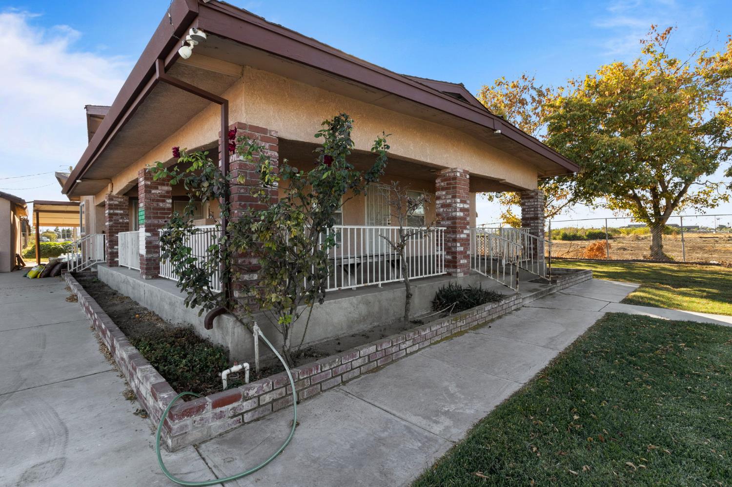 5000 Nunes Road Turlock, CA 95382 - Photo 28 of 57 a view of a house with backyard and sitting area