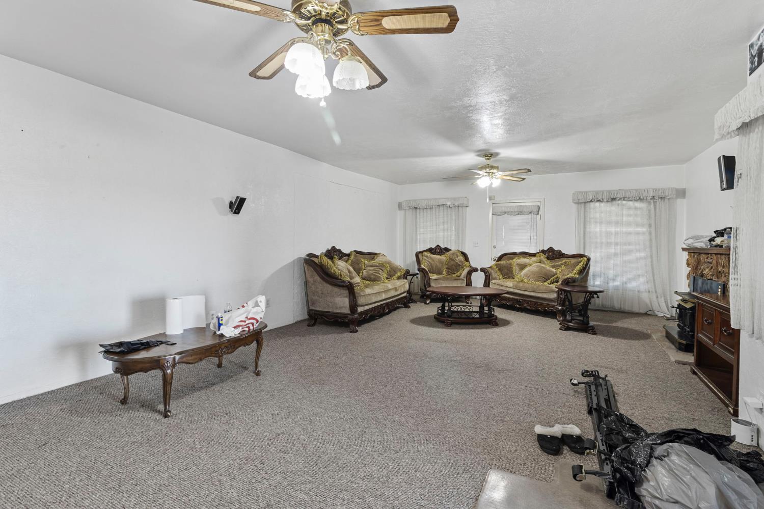 5000 Nunes Road Turlock, CA 95382 - Photo 30 of 57 a view of a livingroom with furniture and a ceiling fan