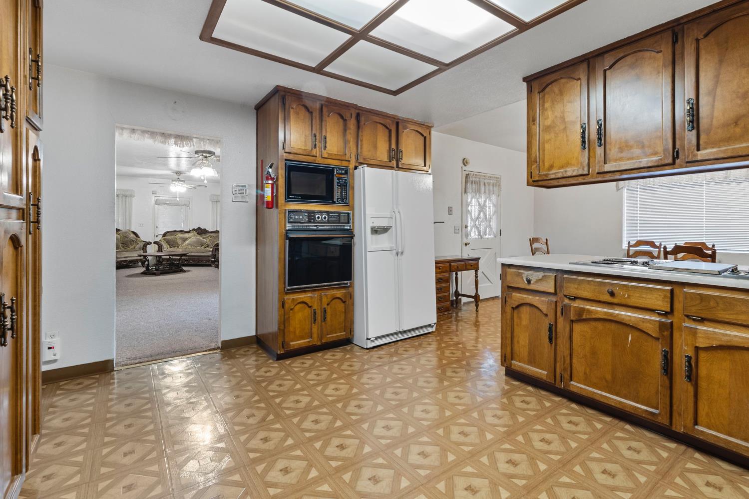 5000 Nunes Road Turlock, CA 95382 - Photo 33 of 57 a kitchen with stainless steel appliances granite countertop a refrigerator and a stove