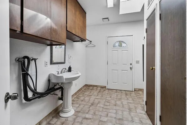 a bathroom with a sink and vanity