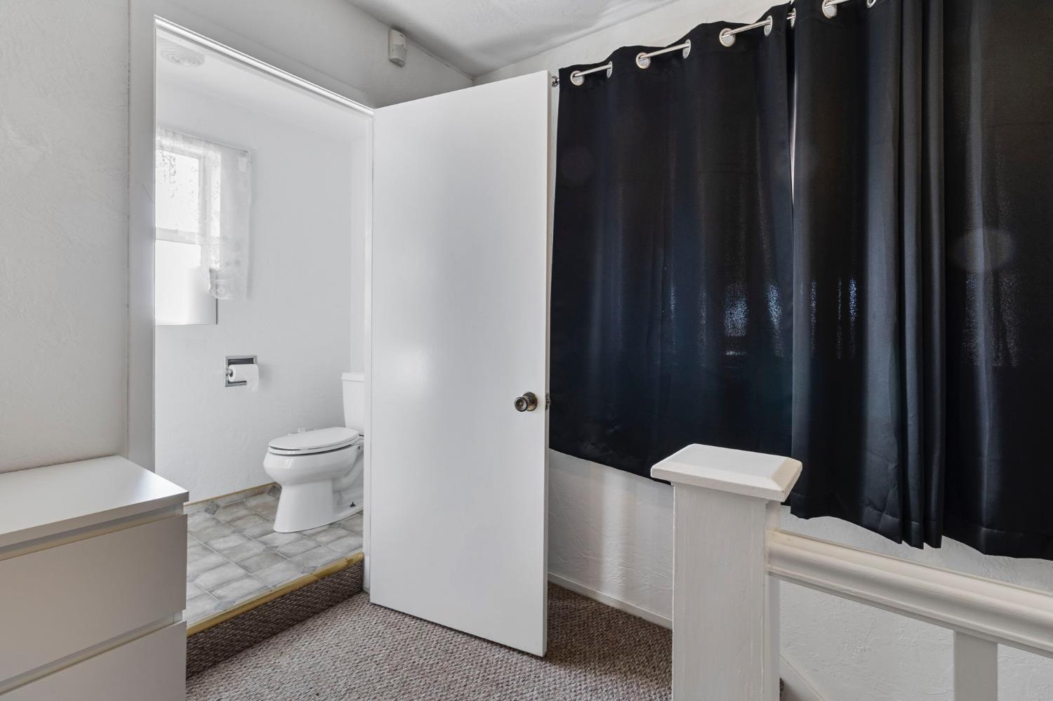 5000 Nunes Road Turlock, CA 95382 - Photo 42 of 57 a bathroom with a shower toilet and sink