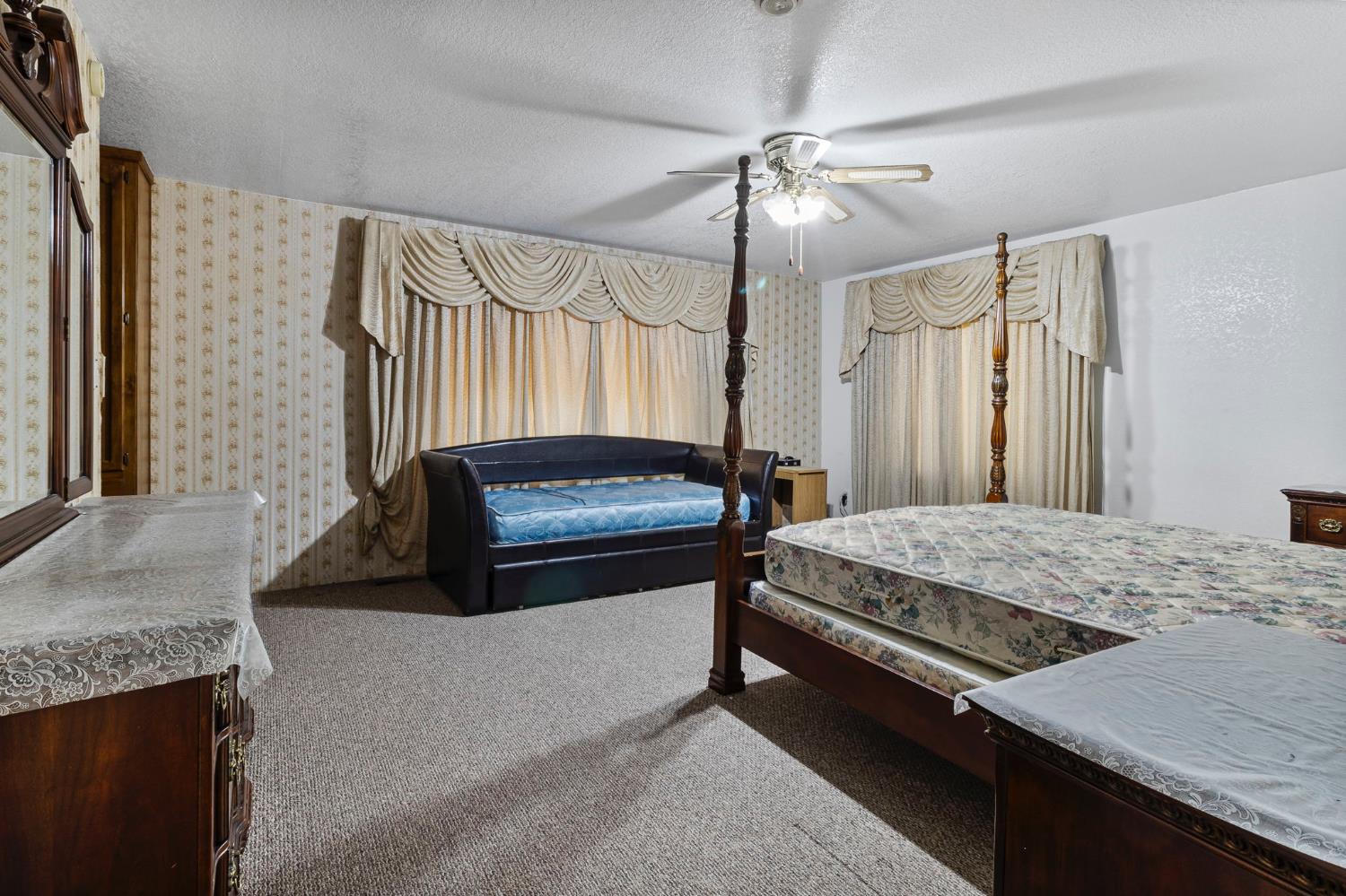 5000 Nunes Road Turlock, CA 95382 - Photo 50 of 57 a bedroom with a bed and a dresser