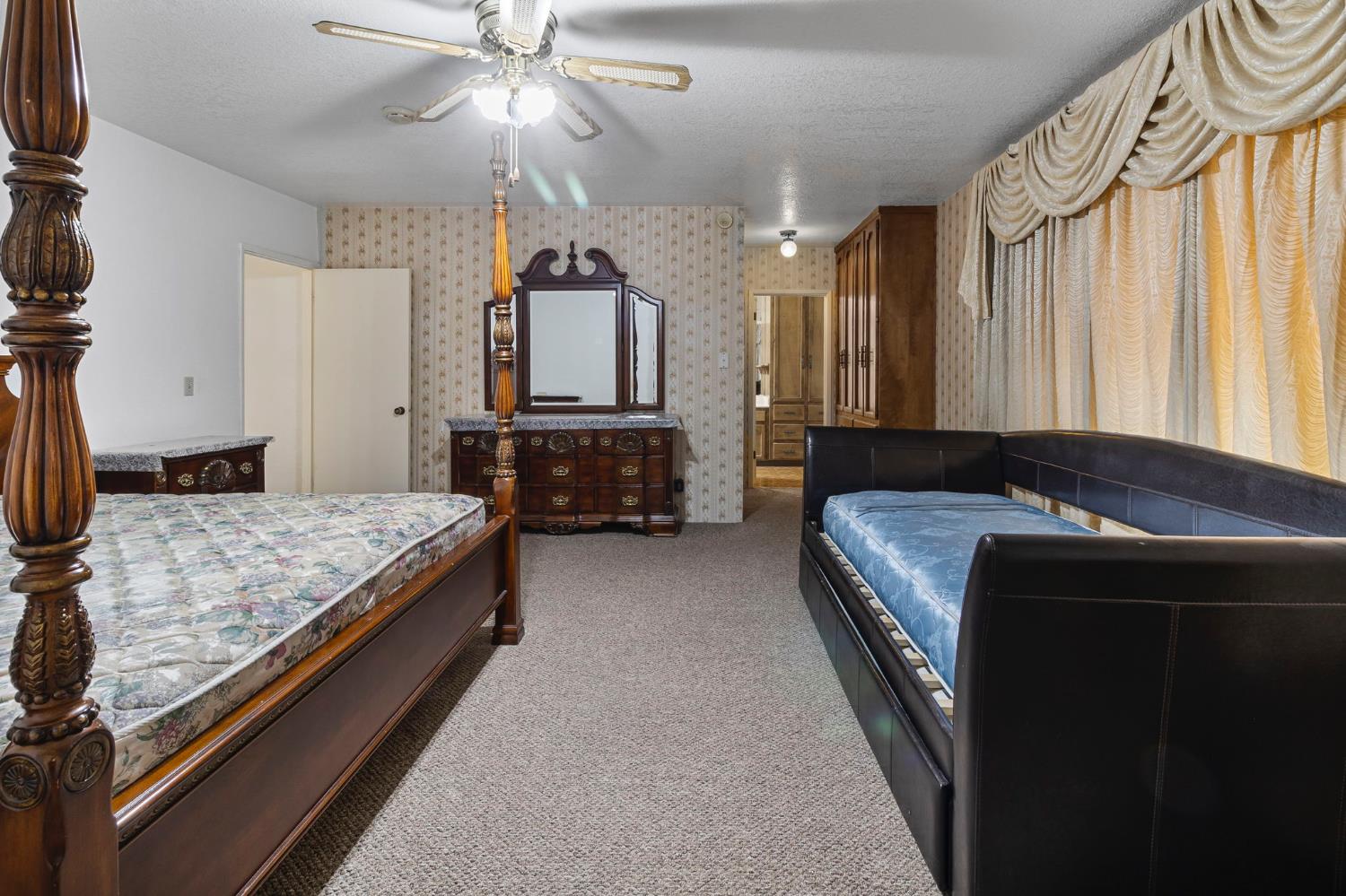 5000 Nunes Road Turlock, CA 95382 - Photo 52 of 57 a bedroom with a bed and window