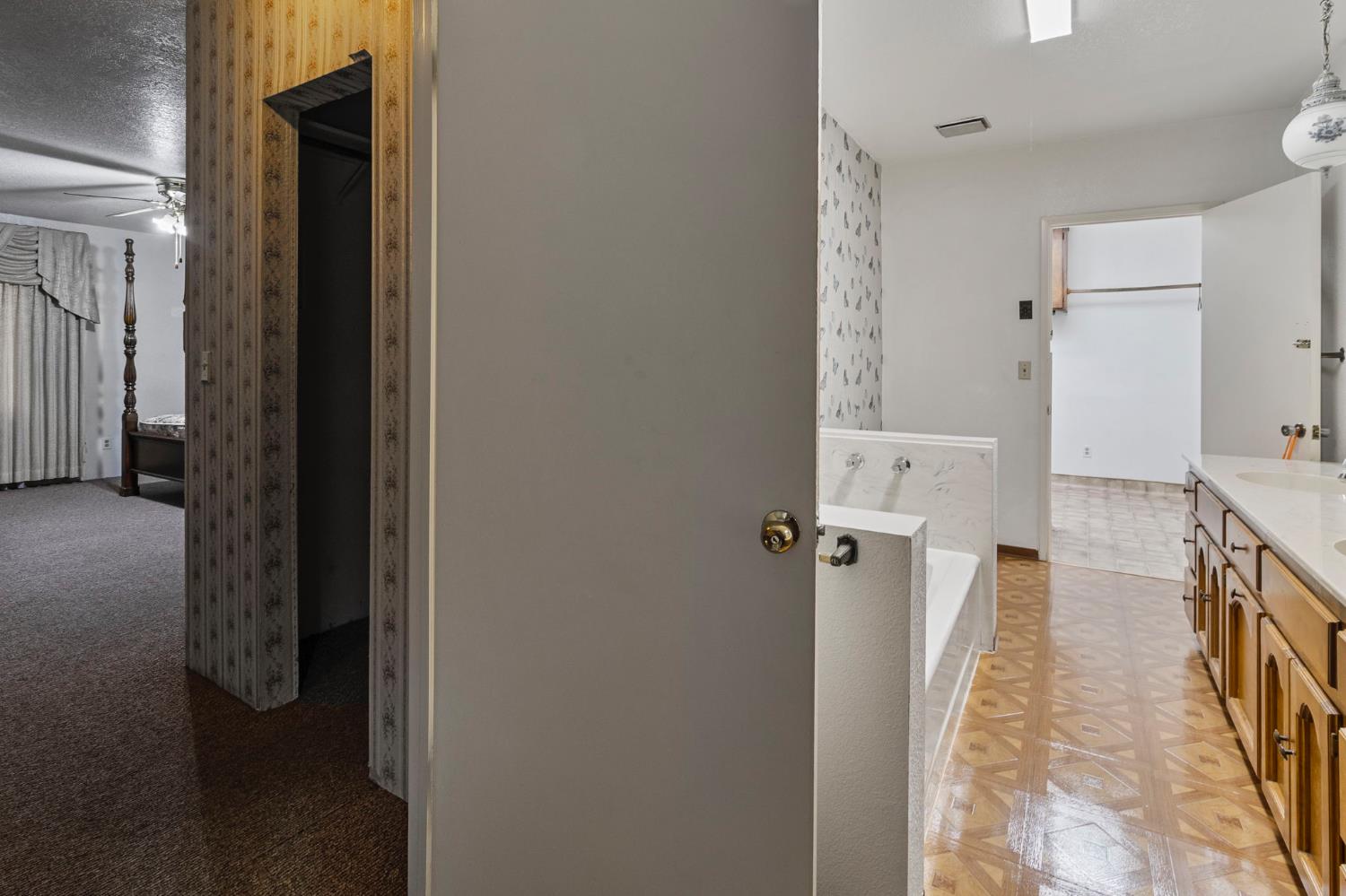 5000 Nunes Road Turlock, CA 95382 - Photo 53 of 57 a view of a bathroom from a hallway