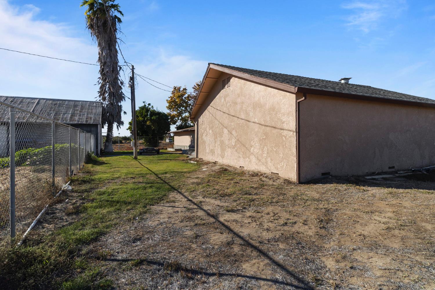 5000 Nunes Road Turlock, CA 95382 - Photo 57 of 57 a backyard of a house with lots of green space