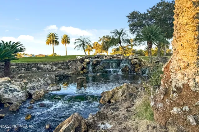 a view of a lake in middle of the town