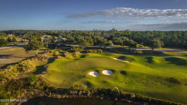 a view of a swimming pool with an outdoor seating and yard