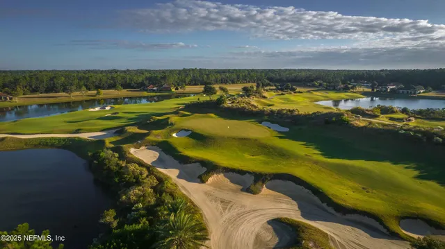 a view of a swimming pool in a backyard