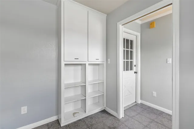 a view of an empty walk in closet
