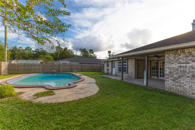 a view of outdoor space yard and swimming pool