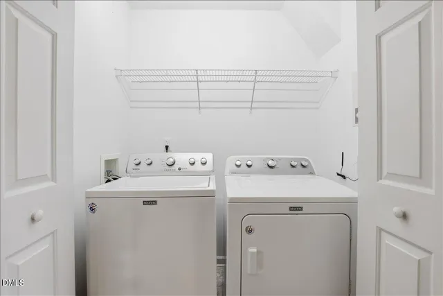 a bathroom with a shower and a bath tub