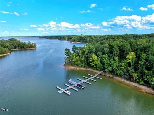 a view of a lake with a yard