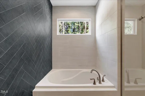 a bathroom with a bathtub