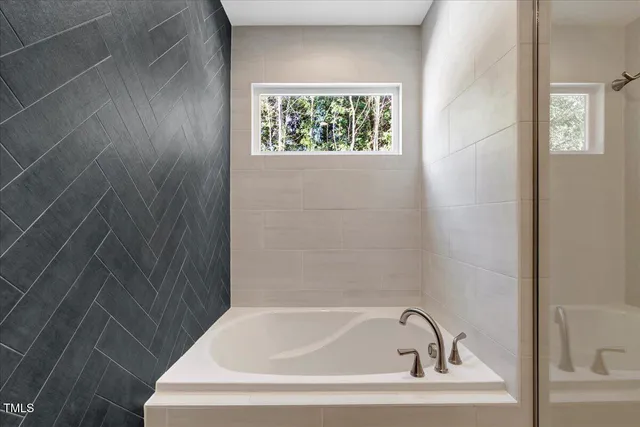 a bathroom with a bathtub