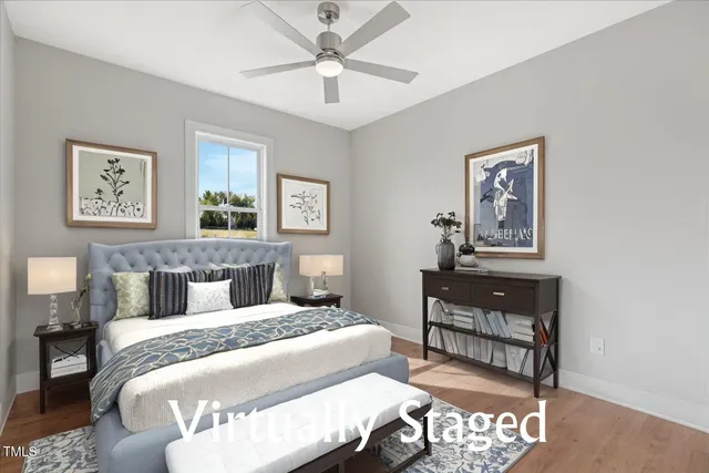 a bedroom with a bed and a table