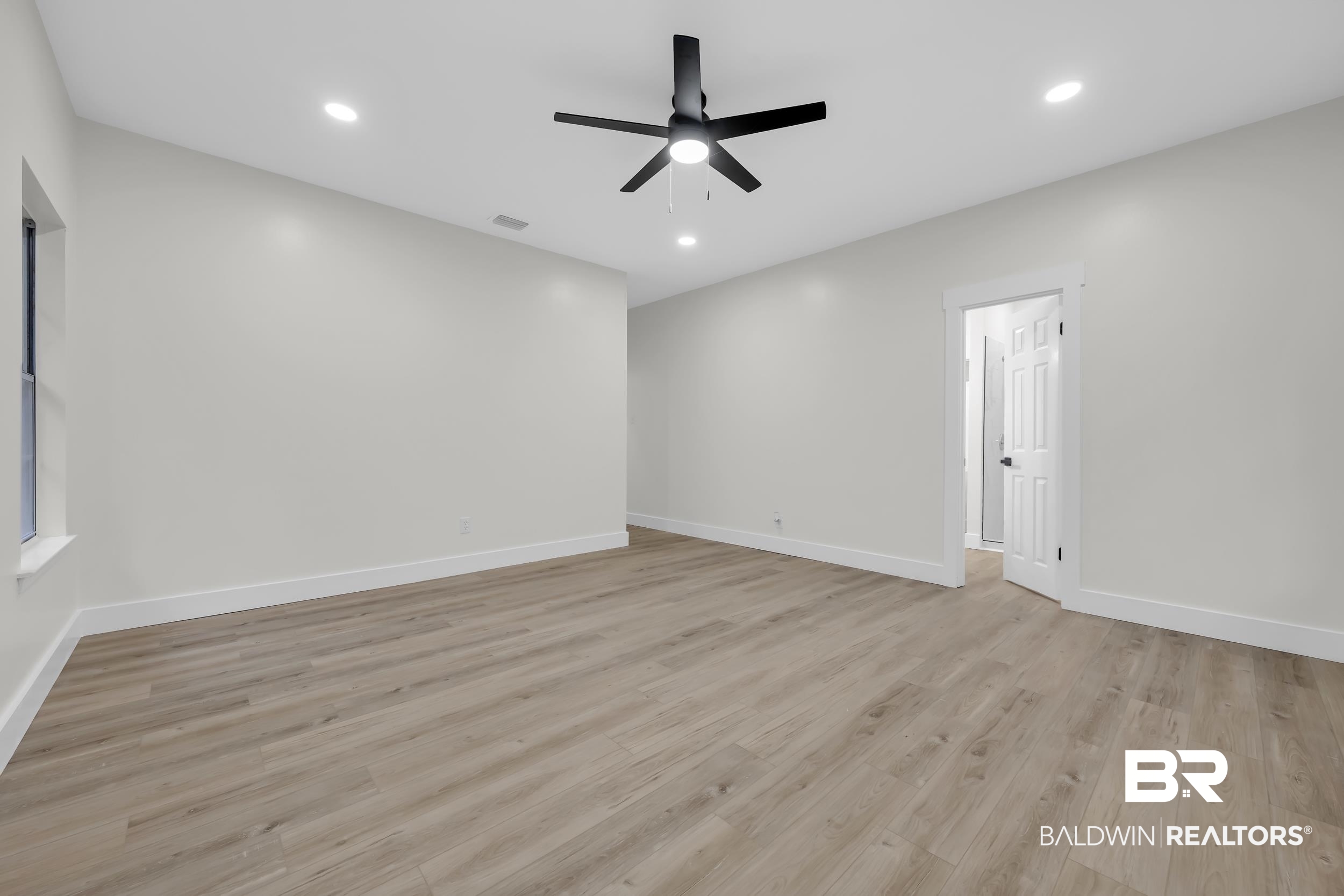 4924 Brooke Court Mobile, AL 36618 - Photo 20 of 34 Spare room featuring light wood-style flooring, recessed lighting, and a ceiling fan