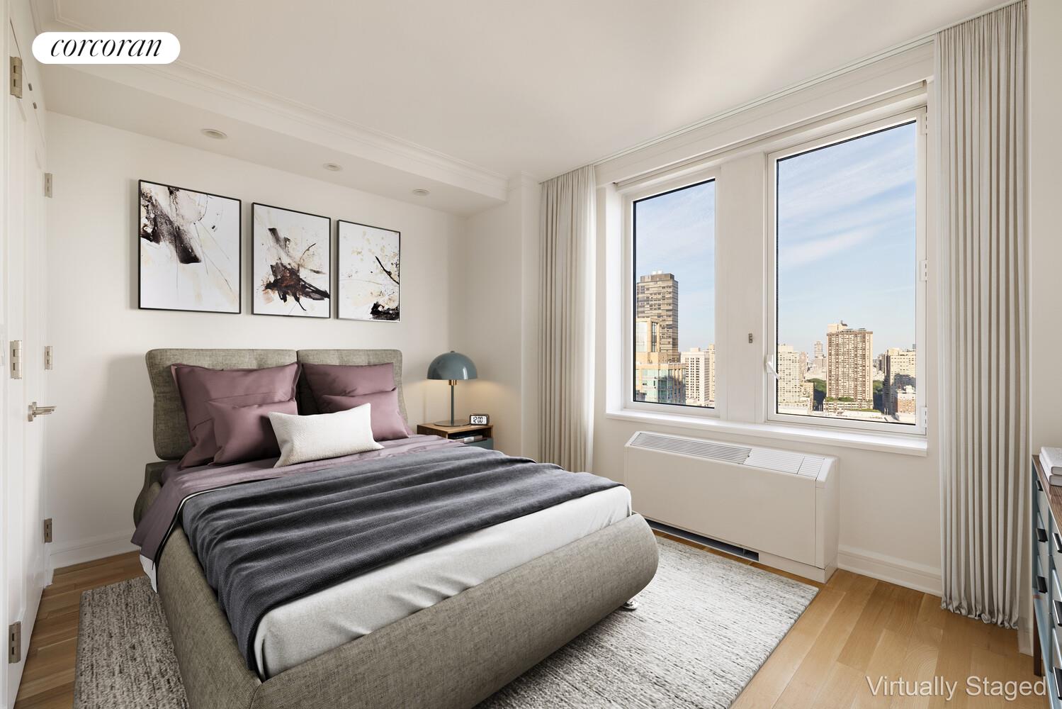 80 Riverside Boulevard, Unit 36B Manhattan, NY 10069 - Photo 13 of 25 a bedroom with a large bed and a window