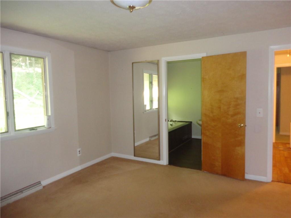 3202 Listonburg Road Confluence, PA 15424 - Photo 14 of 26 a view of an empty room with window and bathroom
