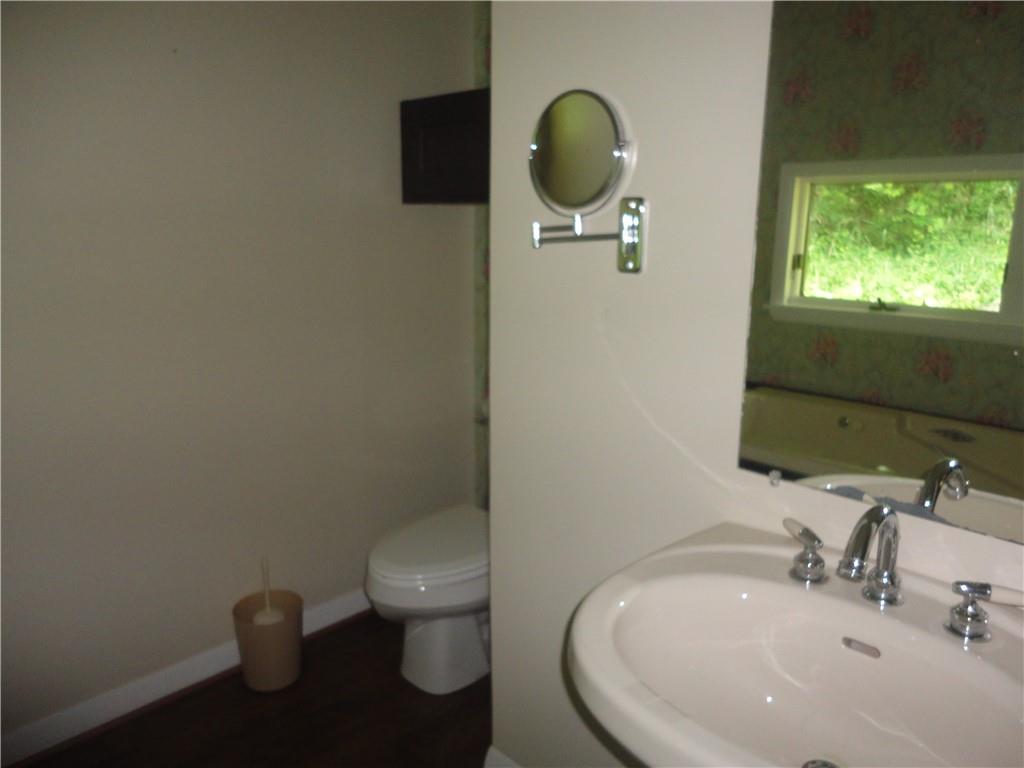 3202 Listonburg Road Confluence, PA 15424 - Photo 16 of 26 a bathroom with a toilet and a sink